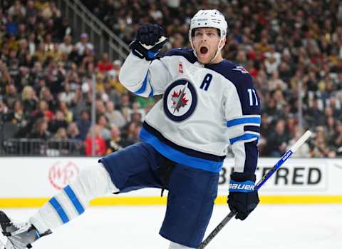 LAS VEGAS, NEVADA – APRIL 20: Adam Lowry #17 of the Winnipeg Jets celebrates after scoring a goal during the first period against the Vegas Golden Knights in Game Two of the First Round of the 2023 Stanley Cup Playoffs at T-Mobile Arena on April 20, 2023 in Las Vegas, Nevada. (Photo by Chris Unger/Getty Images)