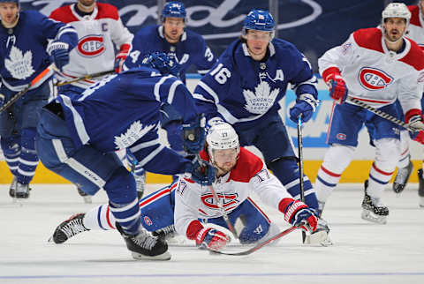 TORONTO, ON – MAY 31: Josh Anderson #17 of the Montreal Canadiens is tripped up by Mitchell Marner #16 of the Toronto Maple Leafs   (Photo by Claus Andersen/Getty Images)