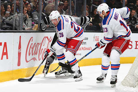 LOS ANGELES, CA – MARCH 25: Jimmy Vesey #26 and Kevin Hayes #13 of the New York Rangers battle for the puck during the game against the Los Angeles Kings on March 25, 2017 at Staples Center in Los Angeles, California. (Photo by Aaron Poole/NHLI via Getty Images) *** Local Caption ***