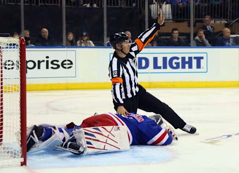 NEW YORK, NEW YORK – DECEMBER 03: Igor Shesterkin #31 of the New York Rangers is injured during the third period against the San Jose Sharks at Madison Square Garden on December 03, 2021 in New York City. The Rangers shutout the Sharks 1-0. (Photo by Bruce Bennett/Getty Images)