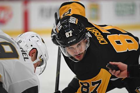 PITTSBURGH, PENNSYLVANIA – NOVEMBER 19: Sidney Crosby #87 of the Pittsburgh Penguins takes a face-off in the first period during the game against the Vegas Golden Knights at PPG PAINTS Arena on November 19, 2023 in Pittsburgh, Pennsylvania. (Photo by Justin Berl/Getty Images)