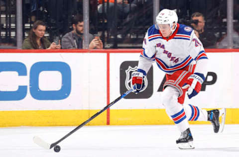 PHILADELPHIA, PENNSYLVANIA – APRIL 13: Kaapo Kakko #24 of the New York Rangers skates with the puck against the Philadelphia Flyers at Wells Fargo Center on April 13, 2022, in Philadelphia, Pennsylvania. (Photo by Tim Nwachukwu/Getty Images)