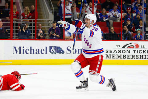 Mar 9, 2017; Raleigh, NC, USA; New York Rangers forward Chris Kreider (20) celebrates his first period goal against the Carolina Hurricanes at PNC Arena. Mandatory Credit: James Guillory-USA TODAY Sports