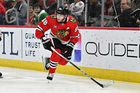 CHICAGO, ILLINOIS – MARCH 15: Patrick Kane #88 of the Chicago Blackhawks skates against the Boston Bruins on March 15, 2022 at the United Center in Chicago, Illinois. (Photo by Jamie Sabau/Getty Images)