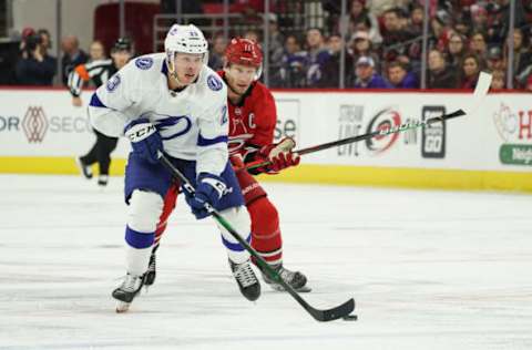 RALEIGH, NC – JANUARY 05: Carolina Hurricanes Center Jordan Staal (11) chases down Tampa Bay Lightning Left Wing Carter Verhaeghe (23) during a game between the Tampa Bay Lightning and the Carolina Hurricanes on January 5, 2020 at the PNC Arena in Raleigh, NC. (Photo by Greg Thompson/Icon Sportswire via Getty Images)