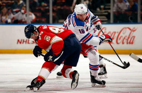 SUNRISE, FL – DECEMBER 8: Jared McCann #90 of the Florida Panthers faces off against Ryan Strome #18 of the New York Rangers at the BB&T Center on December 8, 2018 in Sunrise, Florida. (Photo by Eliot J. Schechter/NHLI via Getty Images)