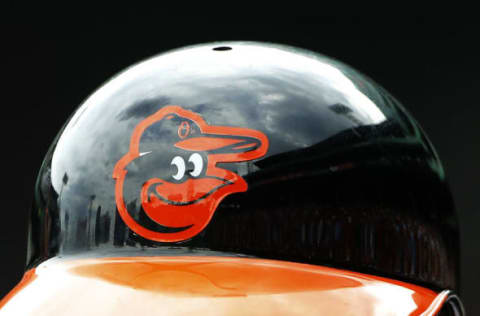 BOSTON, MA – JUNE 25: The Baltimore Orioles logo is seen on a batting helmet during the game between the Boston Red Sox and the Baltimore Orioles at Fenway Park on June 25, 2015 in Boston, Massachusetts. (Photo by Winslow Townson/Getty Images)