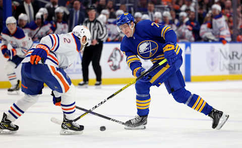 Mar 6, 2023; Buffalo, New York, USA; Edmonton Oilers defenseman Evan Bouchard (2) blocks a shot by Buffalo Sabres center Tage Thompson (72) during the second period at KeyBank Center. Mandatory Credit: Timothy T. Ludwig-USA TODAY Sports