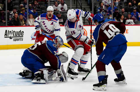 Dec 14, 2021; Denver, Colorado, USA; New York Rangers right wing Julien Gauthier (15) attempts to score past goaltender Darcy Kuemper (35) and Colorado Avalanche defenseman Samuel Girard (49) in the third period at Ball Arena. Mandatory Credit: Ron Chenoy-USA TODAY Sports