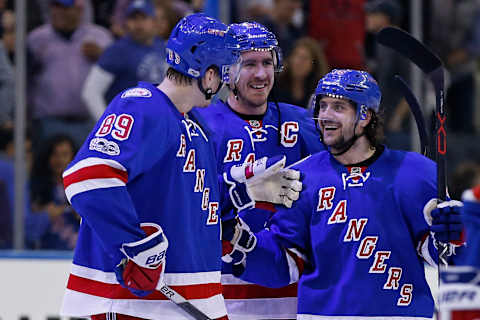 Apr 22, 2017; New York, NY, USA; New York Rangers right wing Mats Zuccarello (36) celebrates with Rangers left wing Pavel Buchnevich (89) after defeating the Montreal Canadiens in game six of the first round of the 2017 Stanley Cup Playoffs at Madison Square Garden. Mandatory Credit: Adam Hunger-USA TODAY Sports