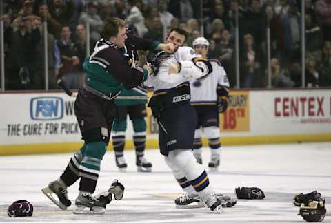 ANAHEIM, CA – DECEMBER 21: Francois Beauchemin #23 of the Mighty Ducks of Anaheim fights with Aaron Downey #47 of the St. Louis Blues during the NHL game at Arrowhead Pond on December 21, 2005, in Anaheim, California. The Ducks defeated the Blues 6-3. (Photo by Harry How/Getty Images)