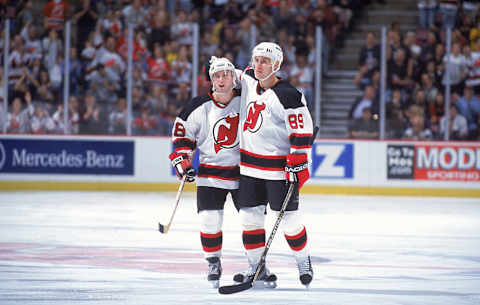 Alexander Mogilny #89 and Brian Rafalski #28 of the New Jersey Devils: (Harry How /Allsport)