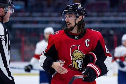 OTTAWA, ON – MARCH 29: Ottawa Senators Defenceman Erik Karlsson (65) talks to the linesman before a face-off during third period National Hockey League action between the Florida Panthers and Ottawa Senators on March 29, 2018, at Canadian Tire Centre in Ottawa, ON, Canada. (Photo by Richard A. Whittaker/Icon Sportswire via Getty Images)