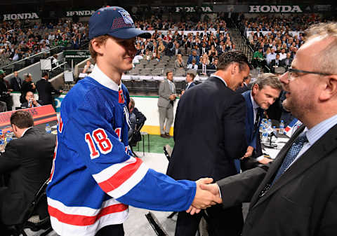 DALLAS, TX – JUNE 22: Vitali Kravtsov greets the team after being selected ninth overall by the New York Rangers during the first round of the 2018 NHL Draft at American Airlines Center on June 22, 2018 in Dallas, Texas. (Photo by Brian Babineau/NHLI via Getty Images)