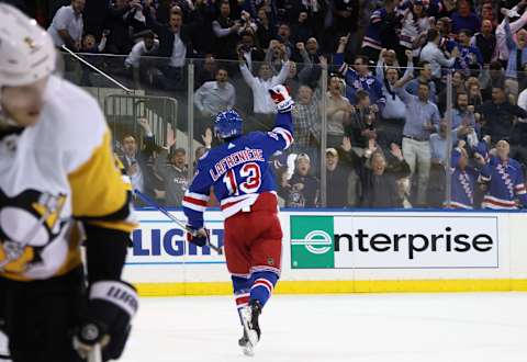 NEW YORK, NEW YORK – MAY 11: Alexis Lafreniere #13 of the New York Rangers celebrates his second period goal against the Pittsburgh Penguins in Game Five of the First Round of the 2022 Stanley Cup Playoffs at Madison Square Garden on May 11, 2022 in New York City. (Photo by Bruce Bennett/Getty Images)