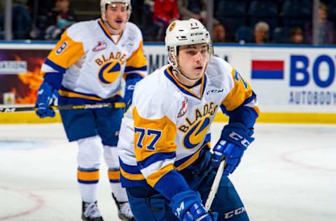 KELOWNA, BC – DECEMBER 01: Kirby Dach #77 of the Saskatoon Blades skates against the Kelowna Rockets at Prospera Place on December 1, 2018 in Kelowna, Canada. (Photo by Marissa Baecker/Getty Images)