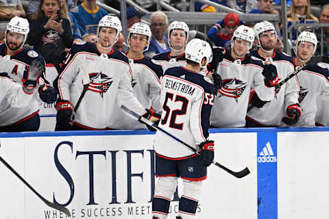 Sep 26, 2023; St. Louis, Missouri, USA; Columbus Blue Jackets right wing Emil Bemstrom (52) is congratulated by teammates after scoring a goal against the St. Louis Blues during the third period at Enterprise Center. Mandatory Credit: Jeff Le-USA TODAY Sports