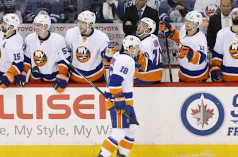 NHL Power Rankings: New York Islanders center Ryan Strome (18) celebrates his goal with teammates during the second period against the Winnipeg Jets at MTS Centre. Mandatory Credit: Bruce Fedyck-USA TODAY Sports