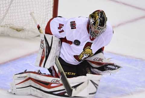 Oct 25, 2016; Vancouver, British Columbia, CAN; Ottawa Senators goaltender Craig Anderson (41) stops a shot on net by the Vancouver Canucks during the second period at Rogers Arena. The Ottawa Senators won 3-0. Mandatory Credit: Anne-Marie Sorvin-USA TODAY Sports