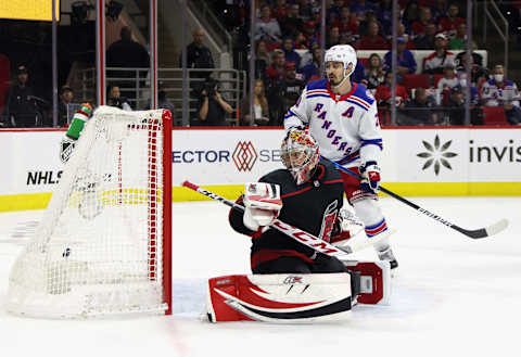 RALEIGH, NORTH CAROLINA – MAY 26: Chris Kreider #20 of the New York Rangers watches a goal by Mika Zibanejad #93 (not shown) on the powerplay goal at 17:03 of the first period against Antti Raanta #32 of the Carolina Hurricanes in Game Five of the Second Round of the 2022 Stanley Cup Playoffs at PNC Arena on May 26, 2022 in Raleigh, North Carolina. (Photo by Bruce Bennett/Getty Images)