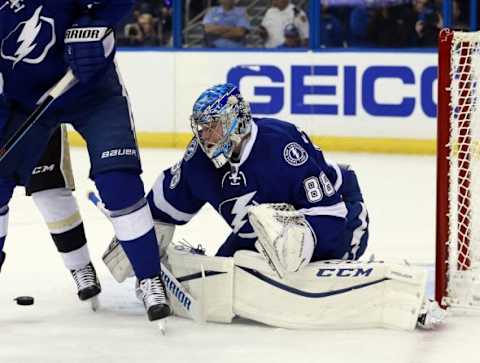 Jan 15, 2016; Tampa, FL, USA; Tampa Bay Lightning goalie Andrei Vasilevskiy (88) makes a save against the Pittsburgh Penguins during the first period at Amalie Arena. Mandatory Credit: Kim Klement-USA TODAY Sports