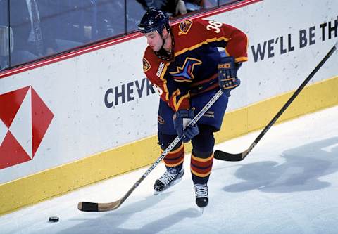 20 Nov 1999: Yannick Tremblay #38 of the Atlanta Thrashers shoots the puck during a game against the Buffalo Sabres at the Marine Midland Arena in Buffalo, New York. The Sabres defeated the Thrashers 4-3. Mandatory Credit: Rick Stewart /Allsport