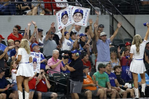 Jun 26, 2023; Arlington, Texas, USA; Texas Rangers fans hold up signs for shortstop Corey Seager (5) (not pictured) during the game against the Detroit Tigers at Globe Life Field. Mandatory Credit: Tim Heitman-USA TODAY Sports