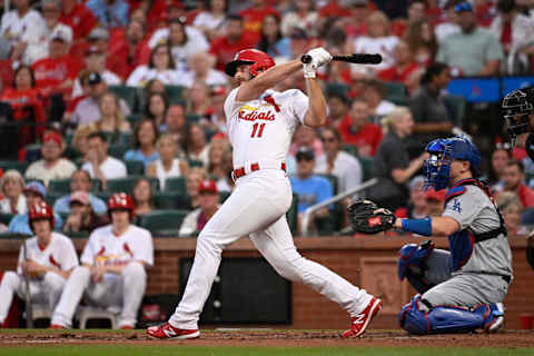 May 18, 2023; St. Louis, Missouri, USA; St. Louis Cardinals shortstop Paul DeJong (11) hits a solo home run against the Los Angeles Dodgers in the third inning at Busch Stadium. Mandatory Credit: Joe Puetz-USA TODAY Sports