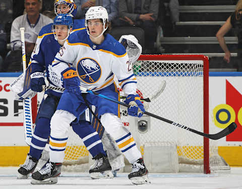 TORONTO, ON – APRIL 12: Owen Power #25 of the Buffalo Sabres skates in his 1st NHL game against Nicholas Abruzzese #26 of the Toronto Maple Leafs at Scotiabank Arena on April 12, 2022 in Toronto, Ontario, Canada. The Sabres defeated the Maple Leafs 5-2. (Photo by Claus Andersen/Getty Images)