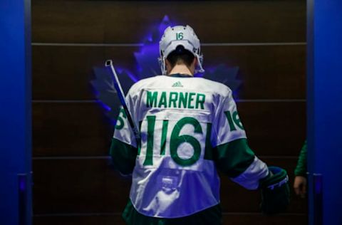 TORONTO, ON – MARCH 15: Mitch Marner #16 of the Toronto Maple Leafs, wearing the alternate St. Pats jersey, heads to the dressing room before facing the Philadelphia Flyers at the Scotiabank Arena on March 15, 2019 in Toronto, Ontario, Canada. (Photo by Kevin Sousa/NHLI via Getty Images)