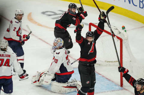 RALEIGH, NC – APRIL 15: Carolina Hurricanes center Jordan Staal (11) reacts after a goal by Carolina Hurricanes defenseman Dougie Hamilton (19) during a game between the Carolina Hurricanes and the Washington Capitals at the PNC Arena in Raleigh, NC on April 15, 2019. (Photo by Greg Thompson/Icon Sportswire via Getty Images)