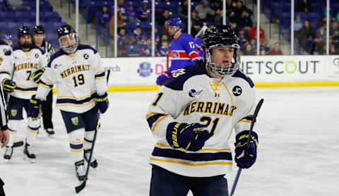 LOWELL, MA – FEBRUARY 24: Matt Copponi #21 of the Merrimack Warriors celebrates his goal during the first period against the UMass Lowell River Hawks during NCAA men’s hockey at the Tsongas Center on February 24, 2023 in Lowell, Massachusetts. The Warriors won 5-3. (Photo by Richard T Gagnon/Getty Images)