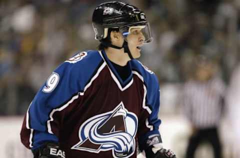 DENVER – SEPTEMBER 18: Paul Kariya #9 of the Colorado Avalanche skates against the Dallas Stars during the NHL preseason game on September 18, 2003, at the Pepsi Center in Denver, Colorado. The Avalanche and the Stars skated to a 2-2 tie. (Photo by Brian Bahr/Getty Images/NHLI)