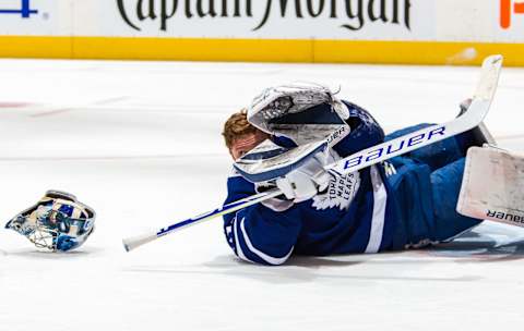 TORONTO, ON – MARCH 25: Frederik Andersen #31 of the Toronto Maple Leafs protests his head at an NHL game against the Florida Panthers during the second period at the Scotiabank Arena on March 25, 2019 in Toronto, Ontario, Canada. (Photo by Kevin Sousa/NHLI via Getty Images)