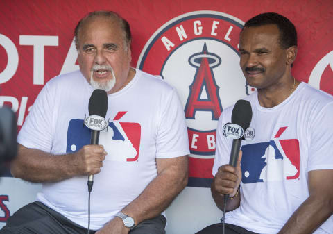 ANAHEIM, CA – SEPTEMBER 28: Fox Desportes broadcasters Amaury Pi-Gonzalez and Jose Mota tape a segment wearing t-shirts with Major League Baseball’s Hispanic Heritage Month logo before the game between the Oakland Athletics and the Los Angeles Angels of Anaheim at Angel Stadium of Anaheim on September 28, 2016 in Anaheim, California. (Photo by Matt Brown/Angels Baseball LP/Getty Images)