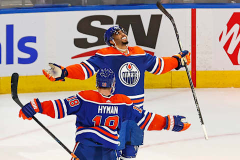 Nov 15, 2023; Edmonton, Alberta, CAN; Edmonton Oilers forward Evander Kane (91) celebrates his over-time winning goal against the Seattle Kraken at Rogers Place. Mandatory Credit: Perry Nelson-USA TODAY Sports