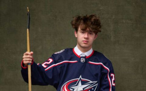 MONTREAL, QUEBEC – JULY 08: Jordan Dumais, #96 pick by the Columbus Blue Jackets, poses for a portrait during the 2022 Upper Deck NHL Draft at Bell Centre on July 08, 2022 in Montreal, Quebec, Canada. (Photo by Minas Panagiotakis/Getty Images)