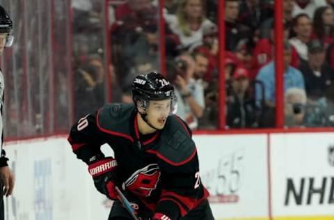 RALEIGH, NC – MAY 16: Sebastian Aho #20 of the Carolina Hurricanes carries the puck in Game Four of the Eastern Conference Third Round against the Boston Bruins during the 2019 NHL Stanley Cup Playoffs on May 16, 2019 at PNC Arena in Raleigh, North Carolina. (Photo by Gregg Forwerck/NHLI via Getty Images)