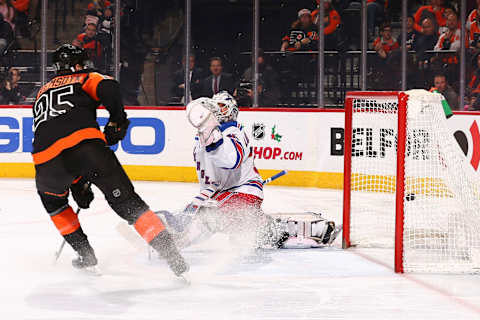 Henrik Lundqvist #30 of the New York Rangers cannot make a save on the goal by Kevin Hayes #13