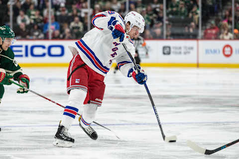 Mar 18, 2017; Saint Paul, MN, USA; New York Rangers forward Pavel Buchnevich (89) shoots during the second period against the Minnesota Wild at Xcel Energy Center. Mandatory Credit: Brace Hemmelgarn-USA TODAY Sports.