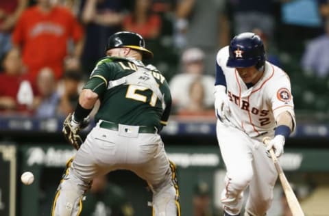 Jonathan Lucroy #21 of the Oakland Athletics is one of the many intriguing catchers set to enter free-agency after the 2018 season. (Photo by Bob Levey/Getty Images)