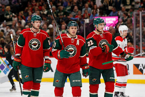 Apr 4, 2017; Saint Paul, MN, USA; Minnesota Wild forward Eric Staal (left), forward Zach Parise (middle), and forward Nino Niederreiter (right) in the second period against the Carolina Hurricanes at Xcel Energy Center. Mandatory Credit: Brad Rempel-USA TODAY Sports