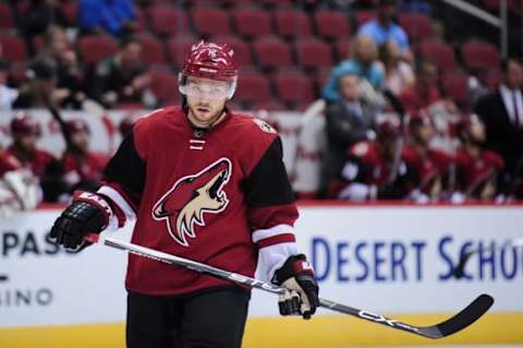 Oct 2, 2015; Glendale, AZ, USA; Arizona Coyotes center Max Domi (16) looks on during the second period against the San Jose Sharks at Gila River Arena. Mandatory Credit: Matt Kartozian-USA TODAY Sports