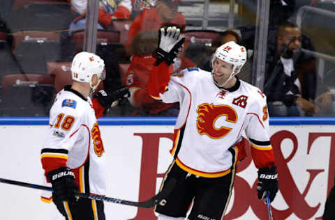 Feb 24, 2017; Sunrise, FL, USA; Calgary Flames right wing Troy Brouwer (36) celebrates his goal against the Florida Panthers with center Matt Stajan (18) in the second period at BB&T Center. Mandatory Credit: Robert Mayer-USA TODAY Sports