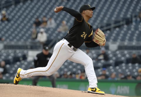 Apr 25, 2023; Pittsburgh, Pennsylvania, USA; Pittsburgh Pirates starting pitcher Johan Oviedo (24) delivers a pitch against the Los Angeles Dodgers during the first inning at PNC Park. Mandatory Credit: Charles LeClaire-USA TODAY Sports