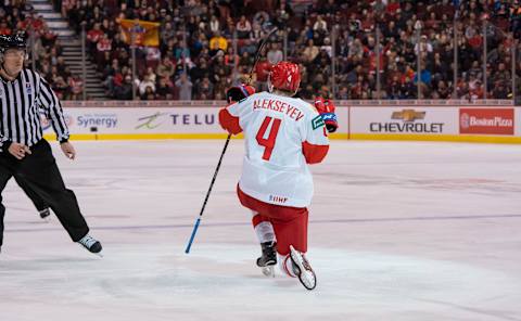 VANCOUVER, BC – DECEMBER 30: Alexander Alexeyev #4 of Russia celebrates after scoring a goal against Switzerland in Group A hockey action of the 2019 IIHF World Junior Championship action on December, 30, 2018 at Rogers Arena in Vancouver, British Columbia, Canada. (Photo by Rich Lam/Getty Images)