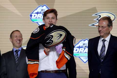 Trevor Zegras reacts after being selected ninth overall by the Anaheim Ducks (Photo by Bruce Bennett/Getty Images)