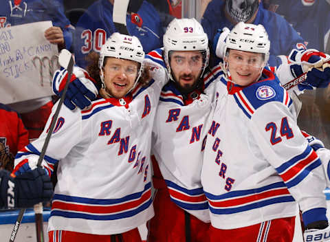 SUNRISE, FL – DECEMBER 29: Mika Zibanejad #93 celebrates his second period goal with Artemi Panarin #10 and Kaapo Kakko #24 of the New York Rangers against the Florida Panther at the FLA Live Arena on December 29, 2021 in Sunrise, Florida. (Photo by Joel Auerbach/Getty Images)