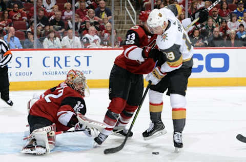 GLENDALE, AZ – OCTOBER 07: Goalie Antti Raanta #32 of the Arizona Coyotes makes a save on the shot by Reilly Smith #19 of the Vegas Golden Knights as Alex Goligoski #33 of the Coyotes defends during the first period at Gila River Arena on October 7, 2017, in Glendale, Arizona. (Photo by Norm Hall/NHLI via Getty Images)