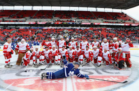 TORONTO, ON – DECEMBER 31: Toronto Maple Leafs alumni Lanny McDonald #7 slides across the ice in front of the Detroit Red Wings alumni team before the 2017 Rogers NHL Centennial Classic Alumni Game at Exhibition Stadium on December 31, 2016 in Toronto, Canada. (Photo by Dave Sandford/NHLI via Getty Images)